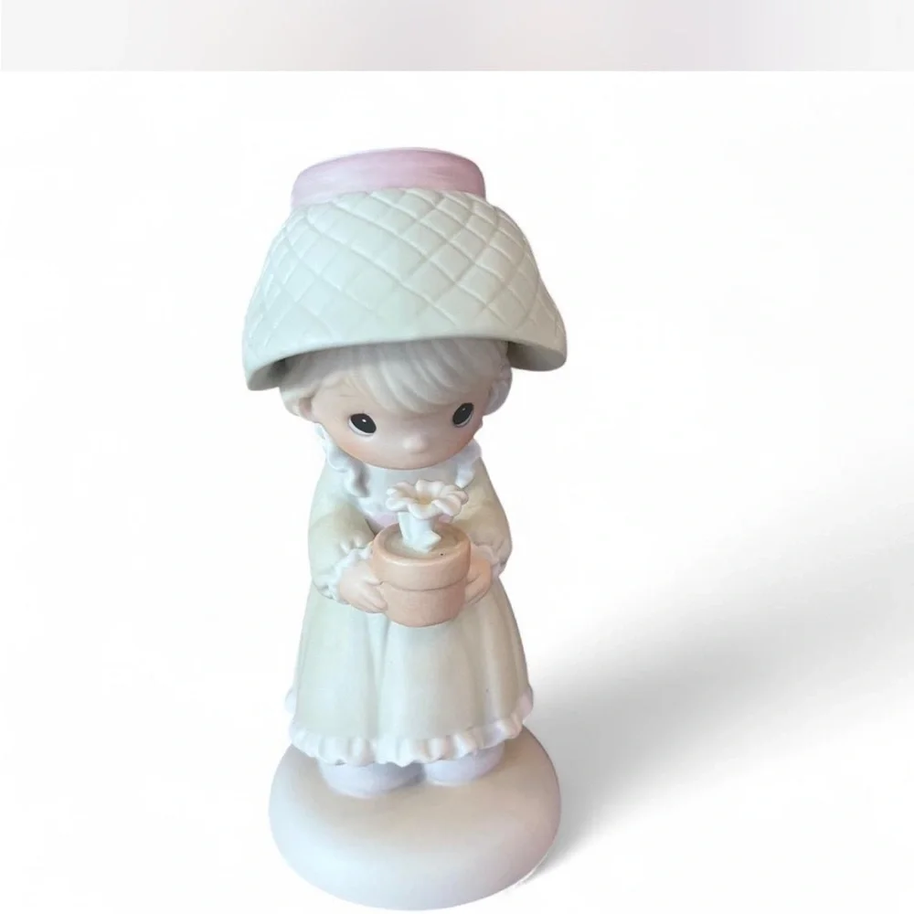 Precious Moments Figurine ‘His Love Will Shine on You’ in excellent condition